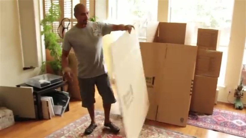 Conan Moving crew handling a piece on a DFW job